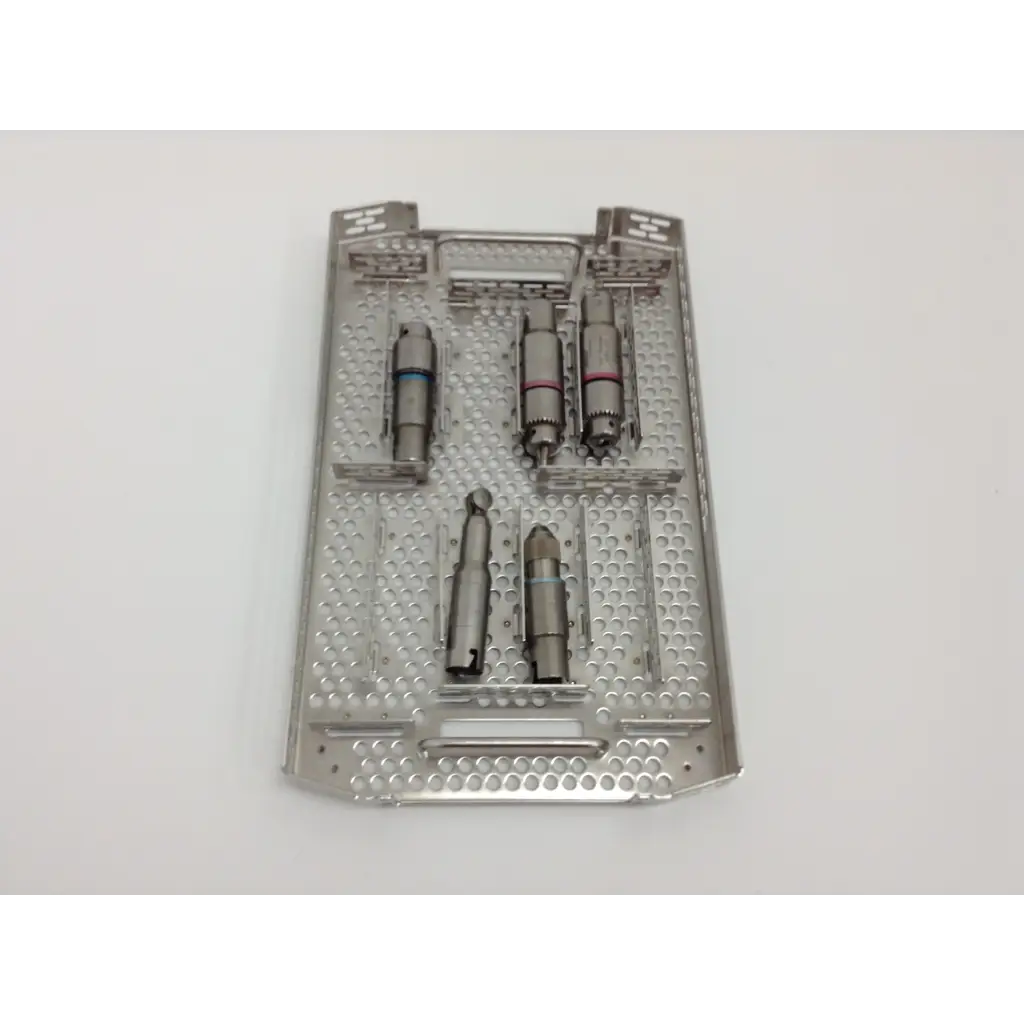 Silver surgical drill bit set in perforated metal tray for stryker system 8 cordless driver 4505 driver set with aesculap case