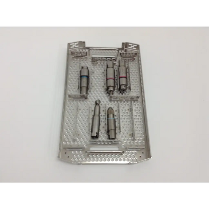 Silver surgical drill bit set in perforated metal tray for stryker system 8 cordless driver 4505 driver set with aesculap case
