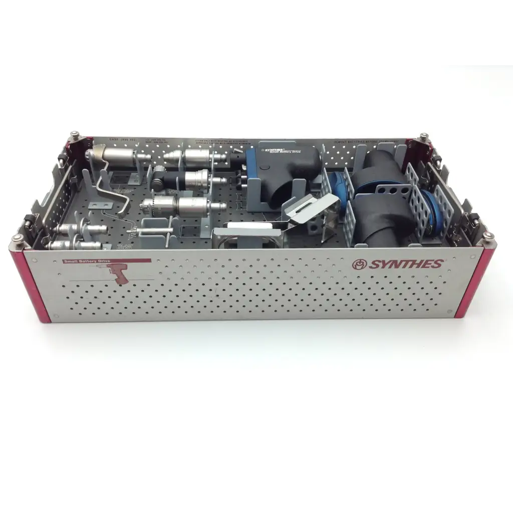 Silver perforated metal swiss synthes small battery power surgical instrument tray with red accents and tools