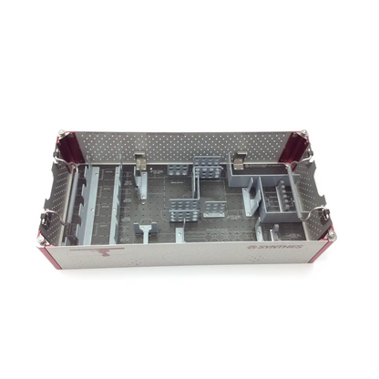 Gray and maroon swiss synthes small battery power drive tray with perforated interior and organized compartments
