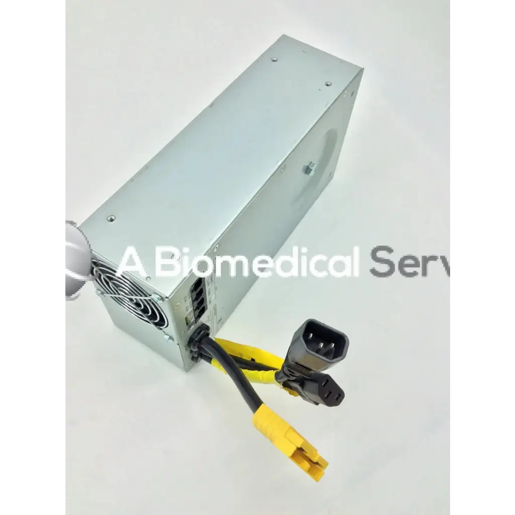 Silver metallic rectangular tripp lite hc150sl medical cart power supply unit with black and yellow cables and connectors