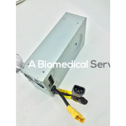 Silver metallic tripp lite hc150sl medical cart power supply 150w 120v with black and yellow cables attached