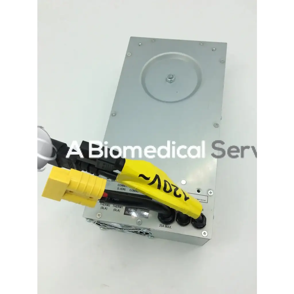 Silver metallic rectangular tripp lite hc150sl medical cart power supply unit with black and yellow connectors 150w 120v