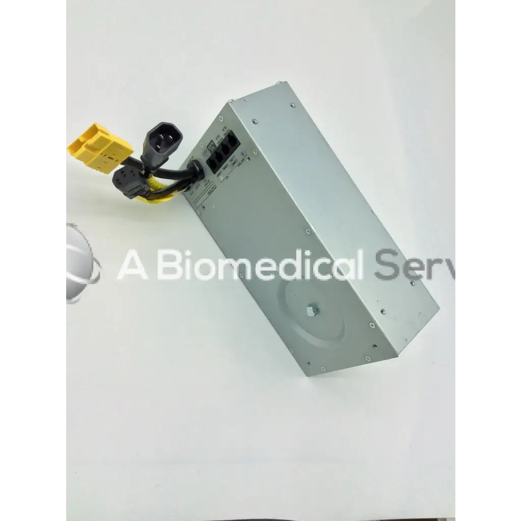 Silver metallic rectangular tripp lite hc150sl medical cart power supply with black and yellow electrical connectors