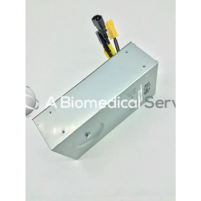 Silver metallic tripp lite hc150sl medical cart power supply 150w 120v with black and yellow cables on one end