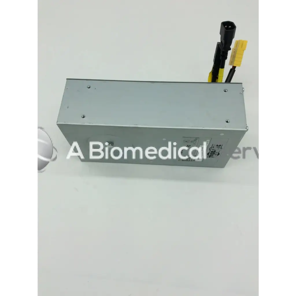 Silver metallic rectangular tripp lite hc150sl medical cart power supply 150w 120v with black and yellow connectors