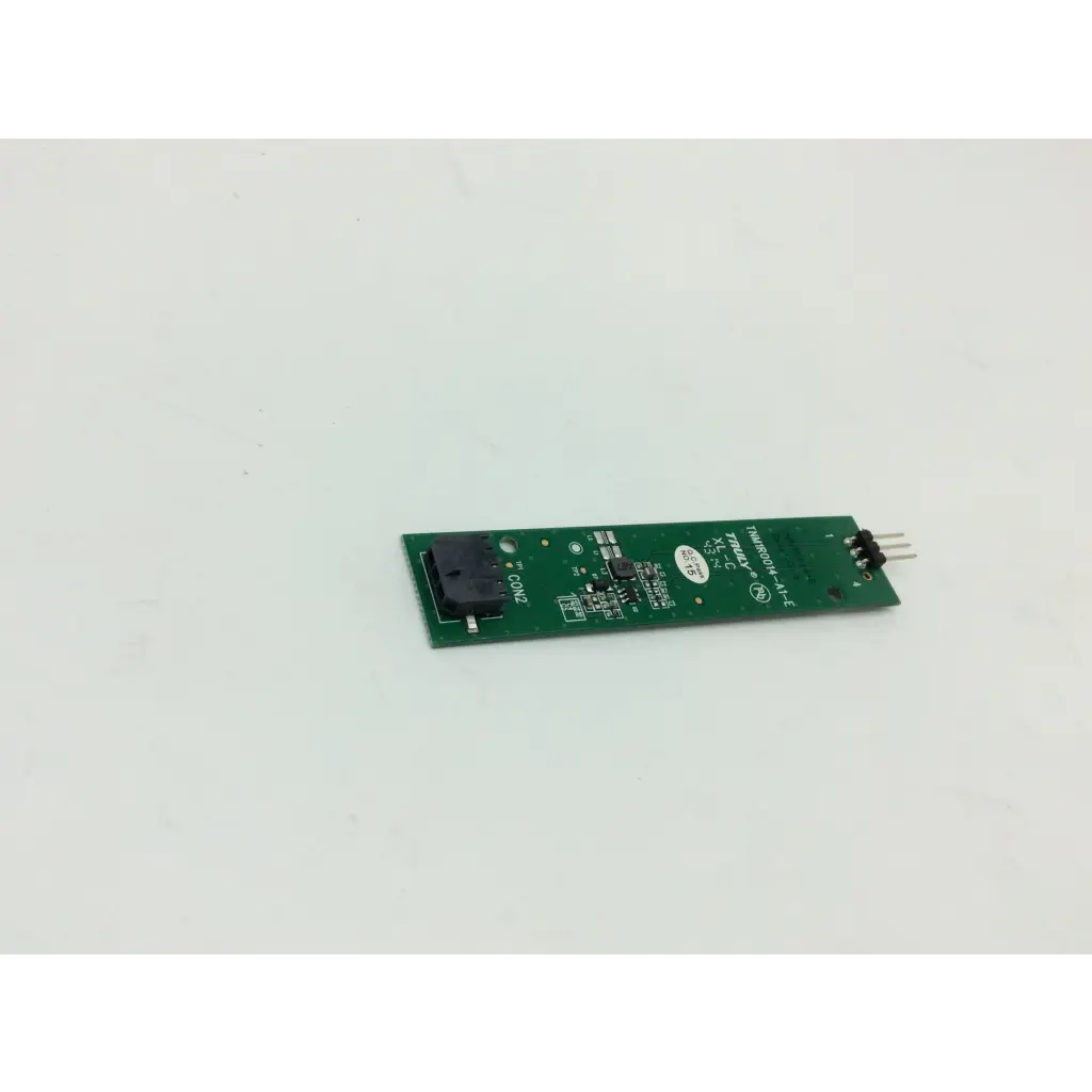 Green rectangular circuit board with black components and silver pins for tnm1r0014-a1-e controller use