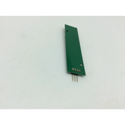 Green rectangular electronic circuit board with three metallic pins for tnm1r0014-a1-e controller use