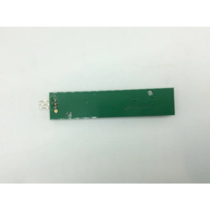 Green rectangular circuit board with three metallic pins and a gold component in tnm1r0014-a1-e controller product