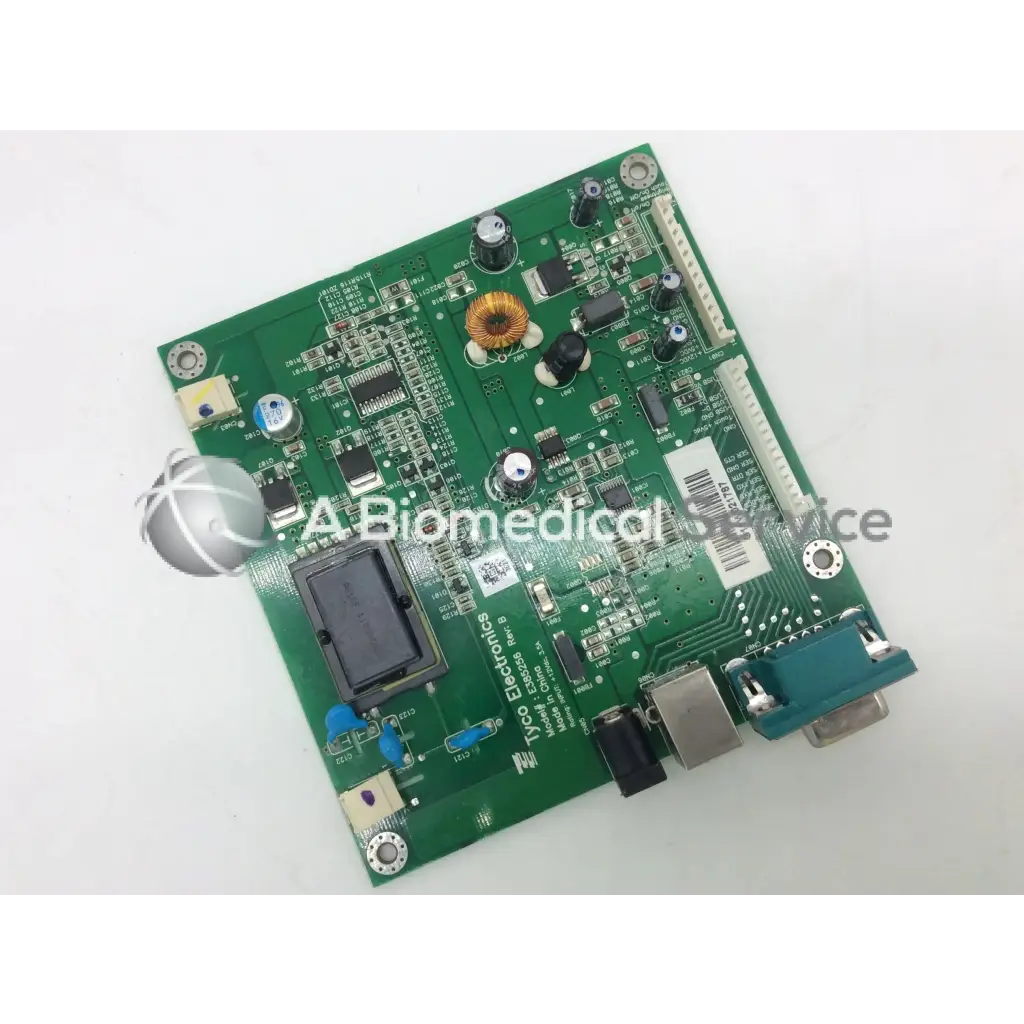 Green printed circuit board with electronic components and connectors in tyco electronics e385256 rev b board
