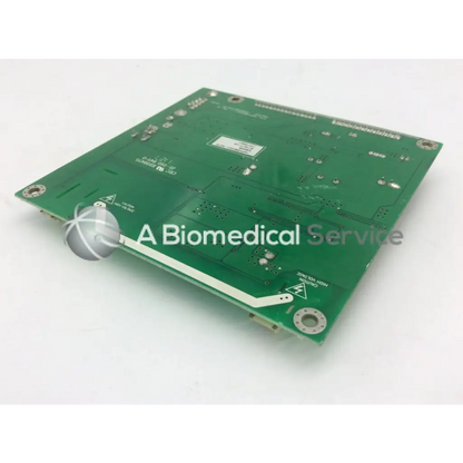 Green rectangular circuit board with silver solder points and white labeling for tyco electronics e385256 rev b use