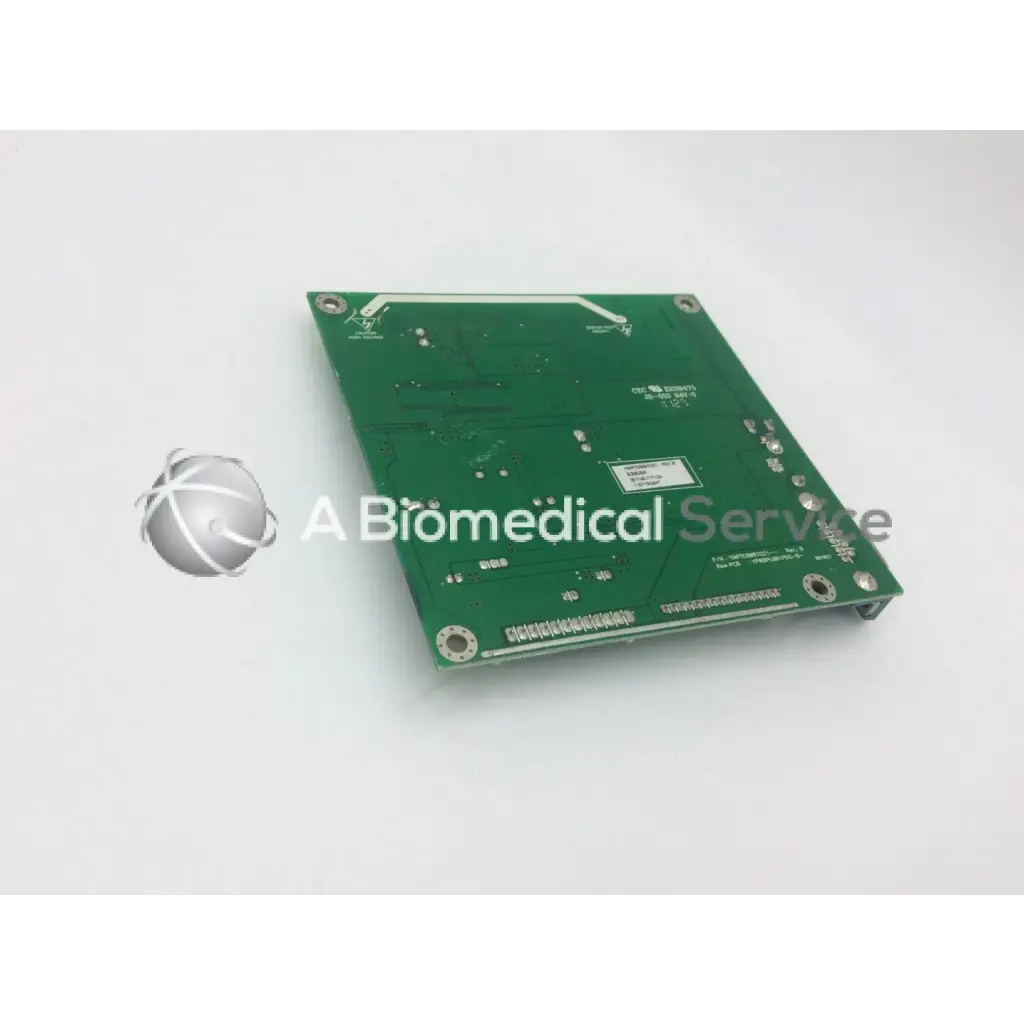 Green rectangular circuit board with silver solder points and component markings tyco electronics e385256 rev b board