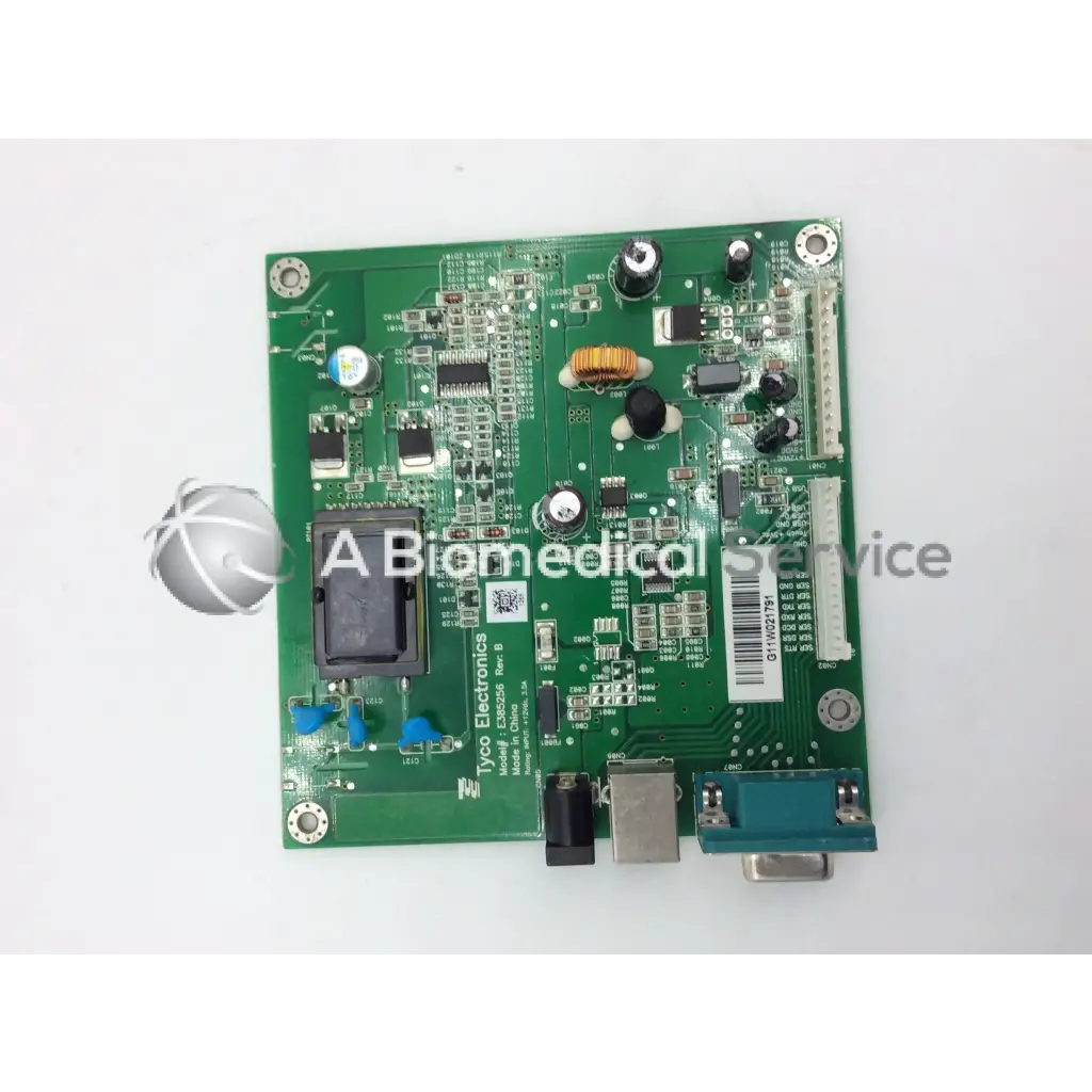 Green printed circuit board with black module and blue connectors for tyco electronics e385256 rev b board