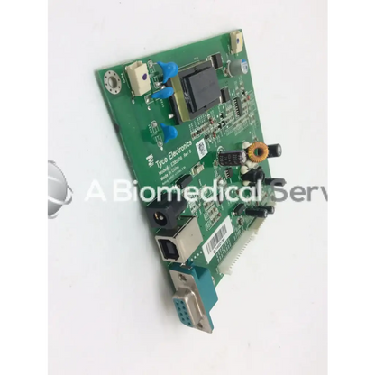 Green printed circuit board labeled tyco electronics model 128503b from tyco electronics e385256 rev b board