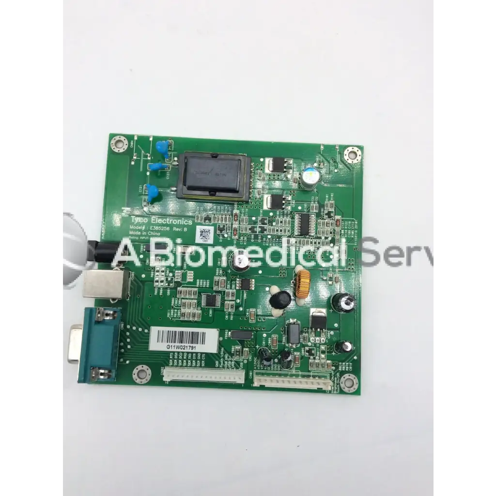 Green printed circuit board with electronic components labeled tyco electronics e385256 rev model c385296 for electronics e385256 rev use