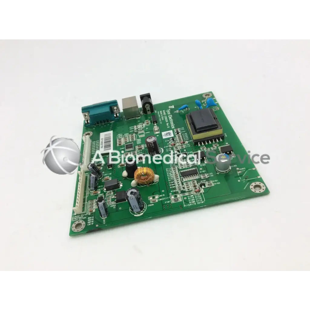 Green printed circuit board with capacitors resistors and ic chip in tyco electronics e385256 rev product board
