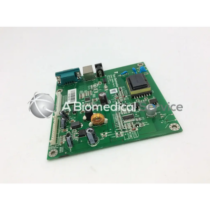 Green printed circuit board with capacitors resistors and ic chip in tyco electronics e385256 rev product board