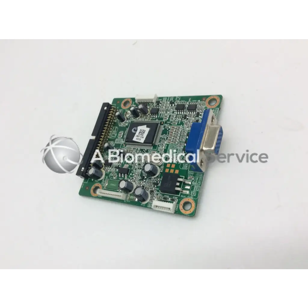 Green circuit board with black components and blue vga port on tyco electronics e670547 rev lcd ctr board