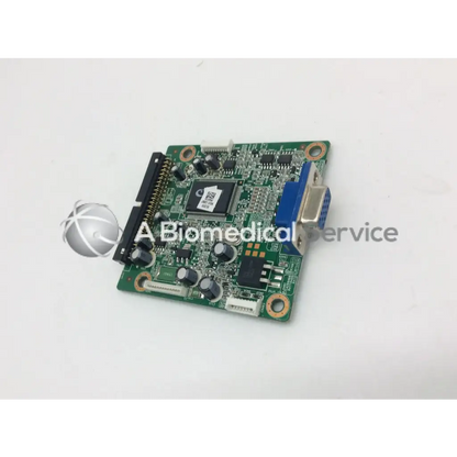 Green circuit board with black components and blue vga port on tyco electronics e670547 rev lcd ctr board