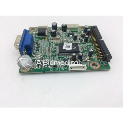 Green circuit board with black components and blue vga connector of tyco electronics e670547 rev lcd ctr board
