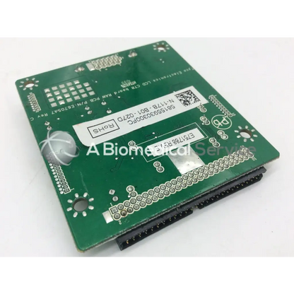 Green rectangular lcd controller board with silver solder points and black pins tyco electronics e670547 rev c