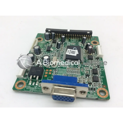 Green circuit board with black silver components blue vga connector and copper grounding rings tyco electronics e670547 rev c lcd ctr board