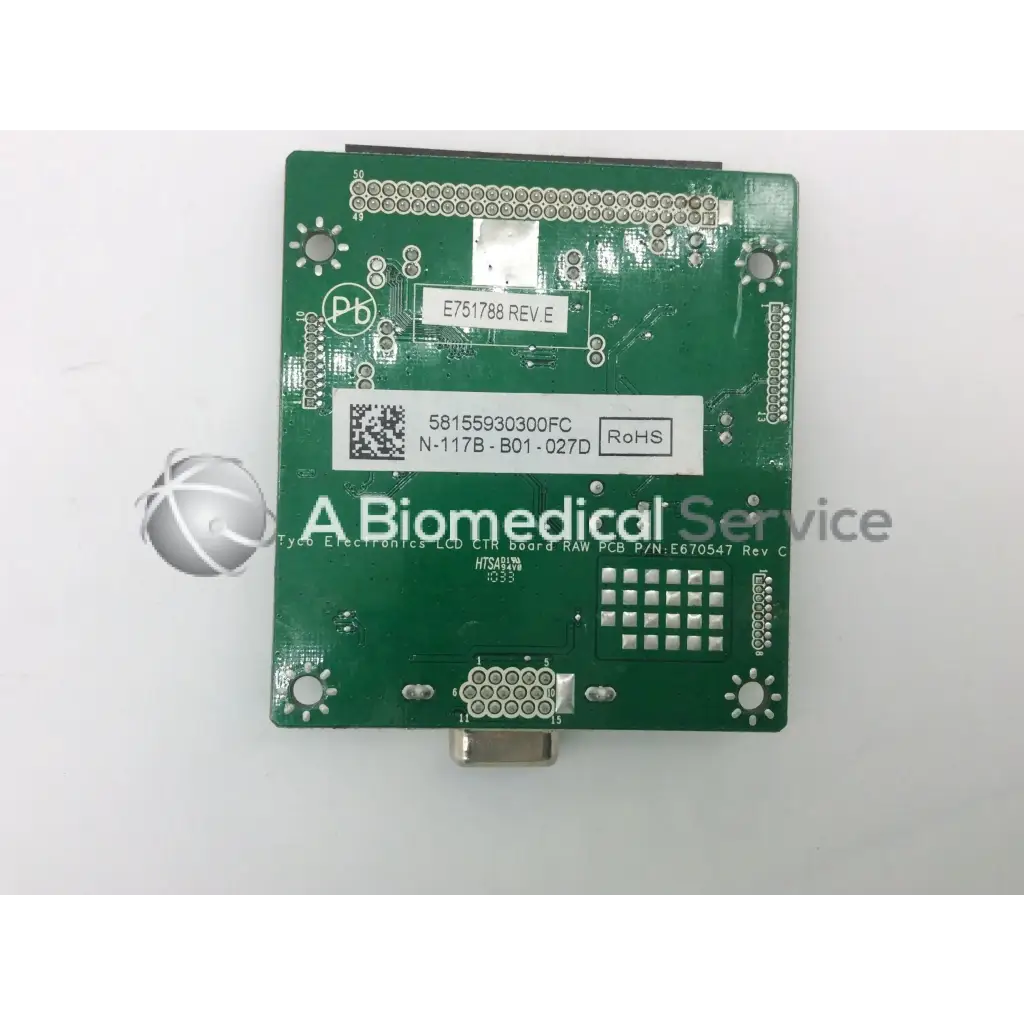 Green rectangular tyco electronics e670547 rev lcd ctr board pcb with silver solder points and white qr code label