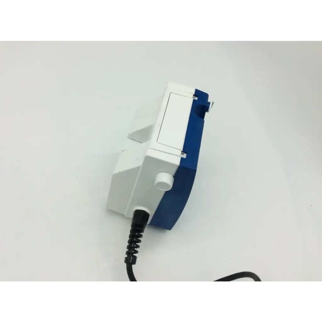 Blue and white electric hand mixer with black coiled cord shown with tyco healthcare kangaroo enteral feeding pump