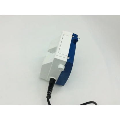 Blue and white electric hand mixer with black coiled cord shown with tyco healthcare kangaroo enteral feeding pump