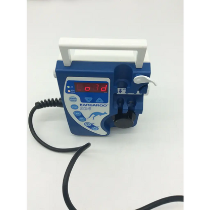 Blue and white Tyco Healthcare Kangaroo 924 enteral feeding pump with digital display showing 01d in red