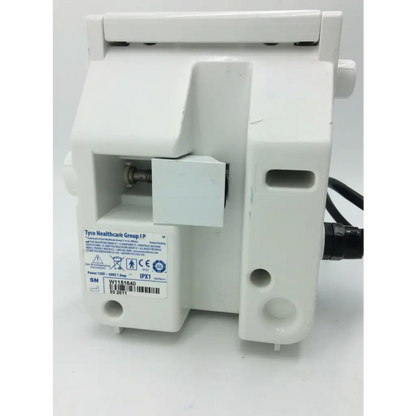 White plastic tyco healthcare kangaroo enteral feeding pump with label from tyco healthcare group lp
