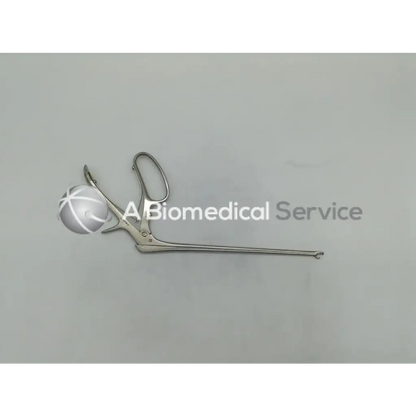 Silver mueller gl1943 tischler cervical biopsy punch forcep with curved handle and white spherical tip for precise tissue sampling