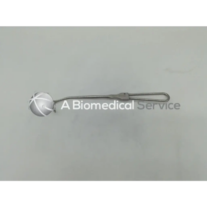 Silver mueller nl1020 cushing retractor with spherical cross-hatched head and slender handle ending in open loop