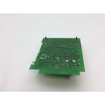 Green rectangular printed circuit board with silver soldered components and copper traces v752606e3 v5631502 board