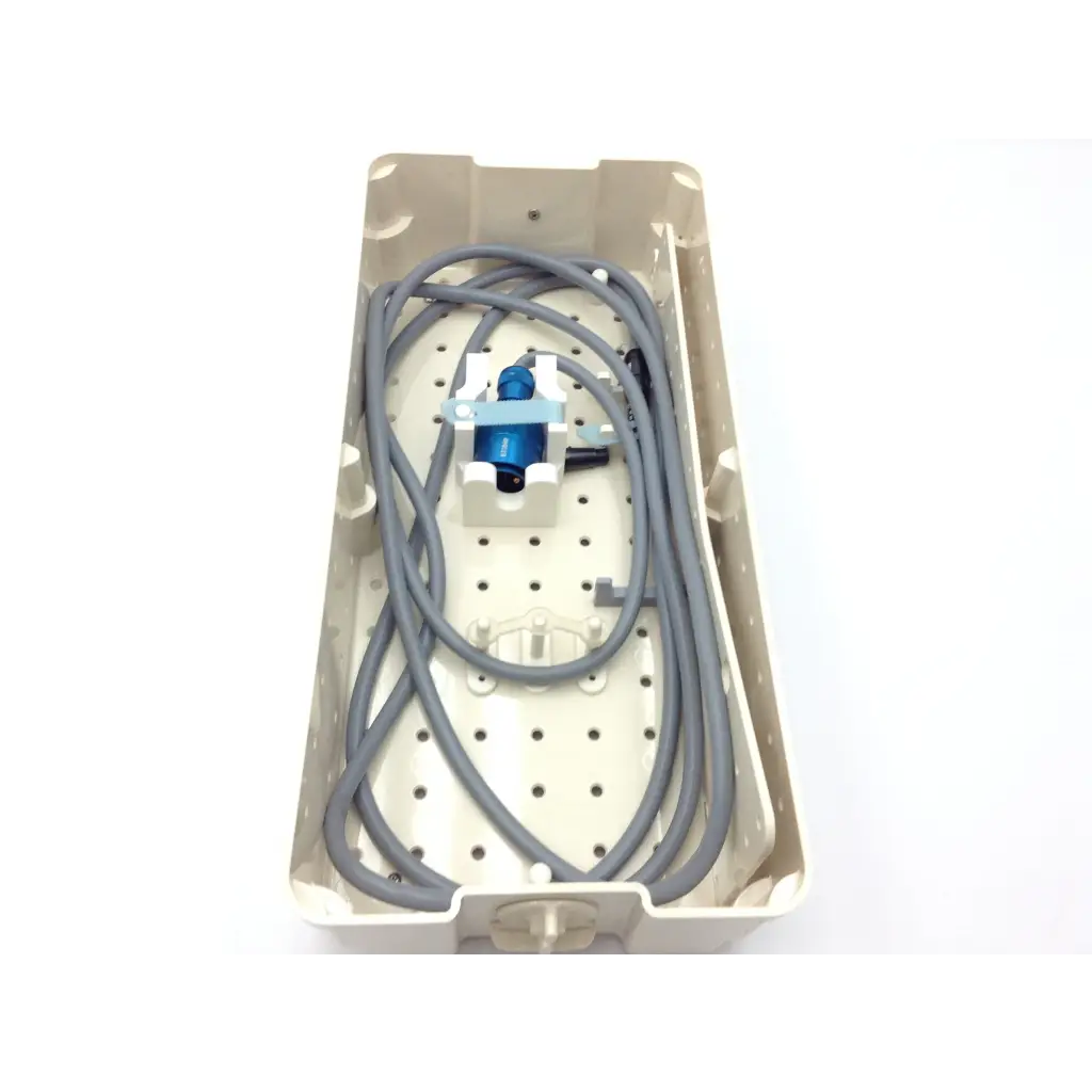 Beige plastic surgical tray with gray tubing and blue valve for valleylab cusa excel 36khz straight handpiece