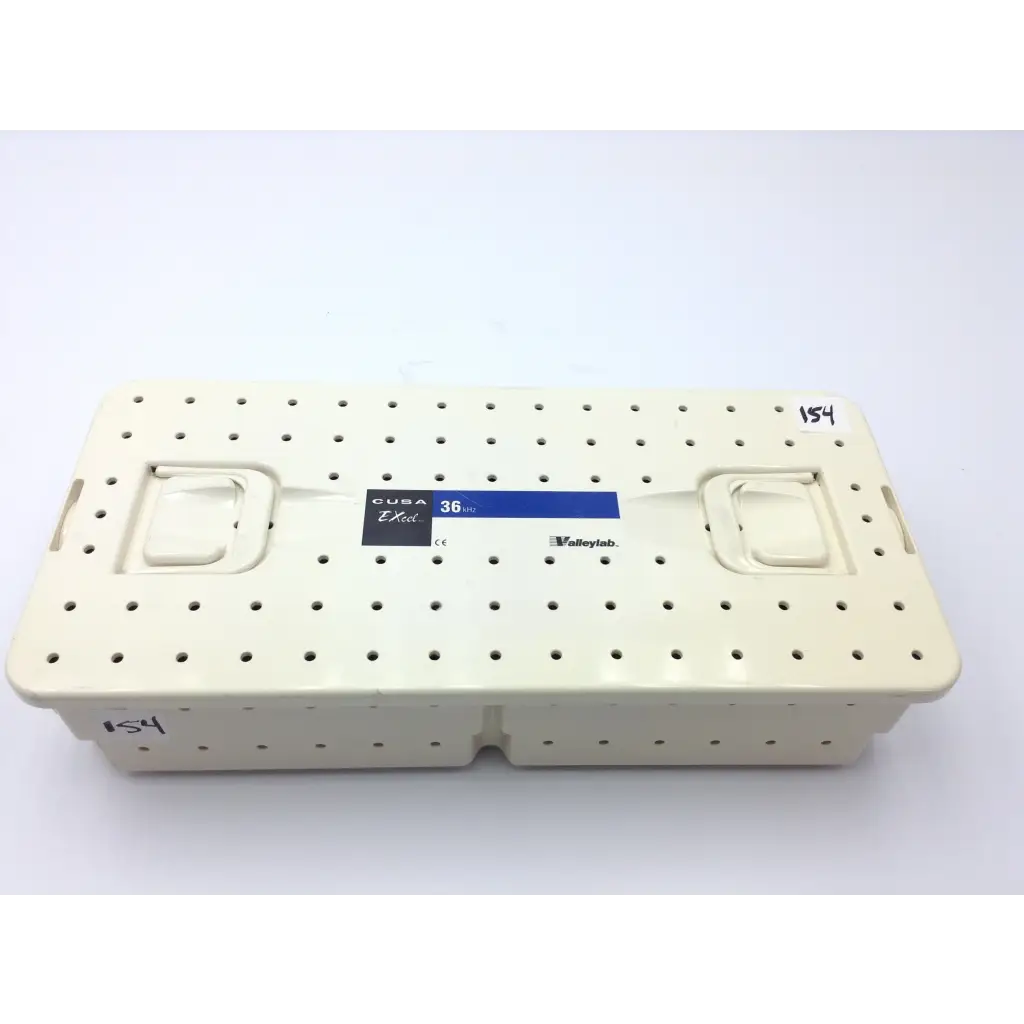 Cream-colored plastic surgical instrument tray with perforated surface and handles for valleylab cusa excel handpiece