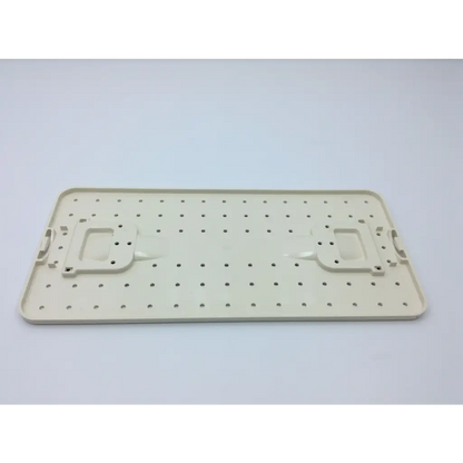 Beige plastic pegboard with evenly spaced holes and handle cutouts for valleylab cusa excel handpiece storage