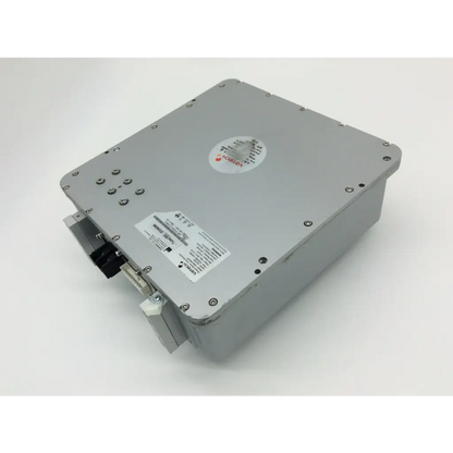 Gray metallic industrial box with circular sticker and label on surface of vatech x-ray generator hdg-07b10t2