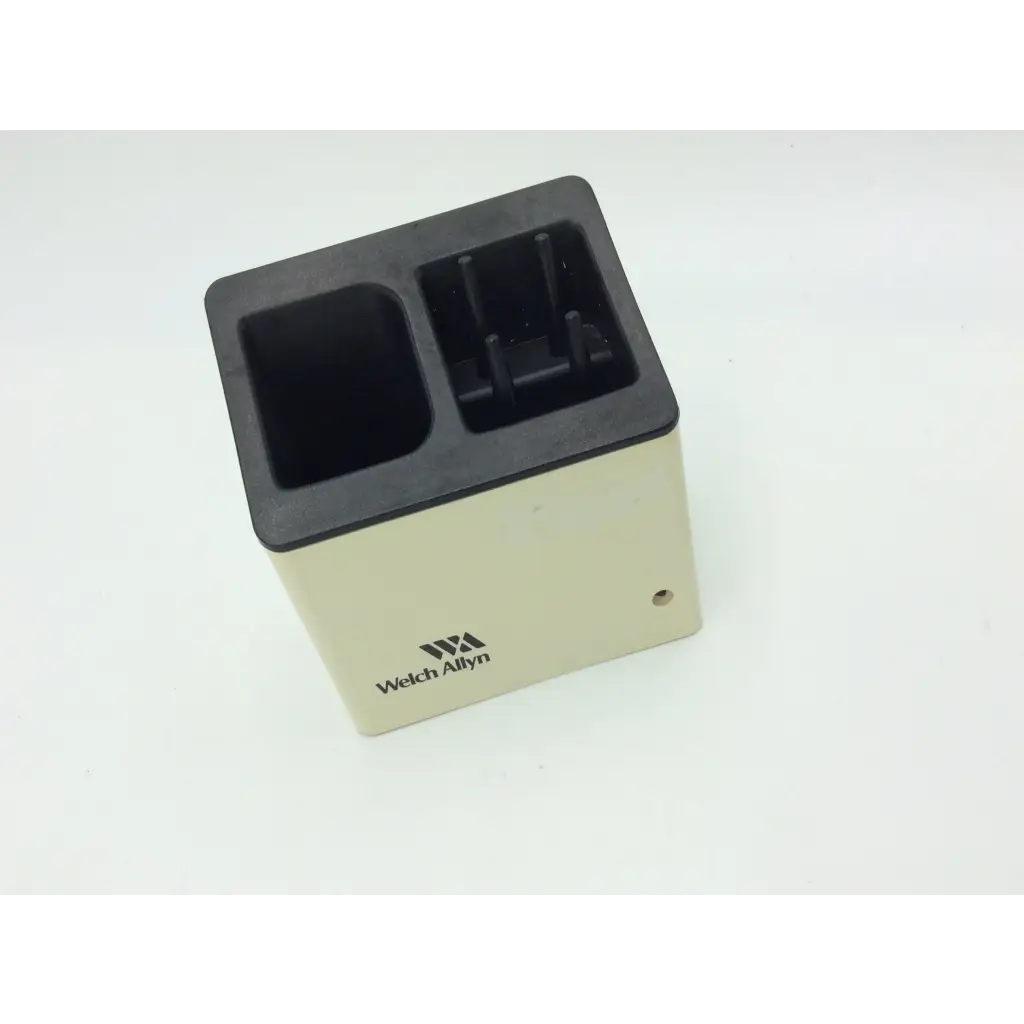 Beige and black welch allyn charging stand 71123 with two compartments for efficient medical device charging