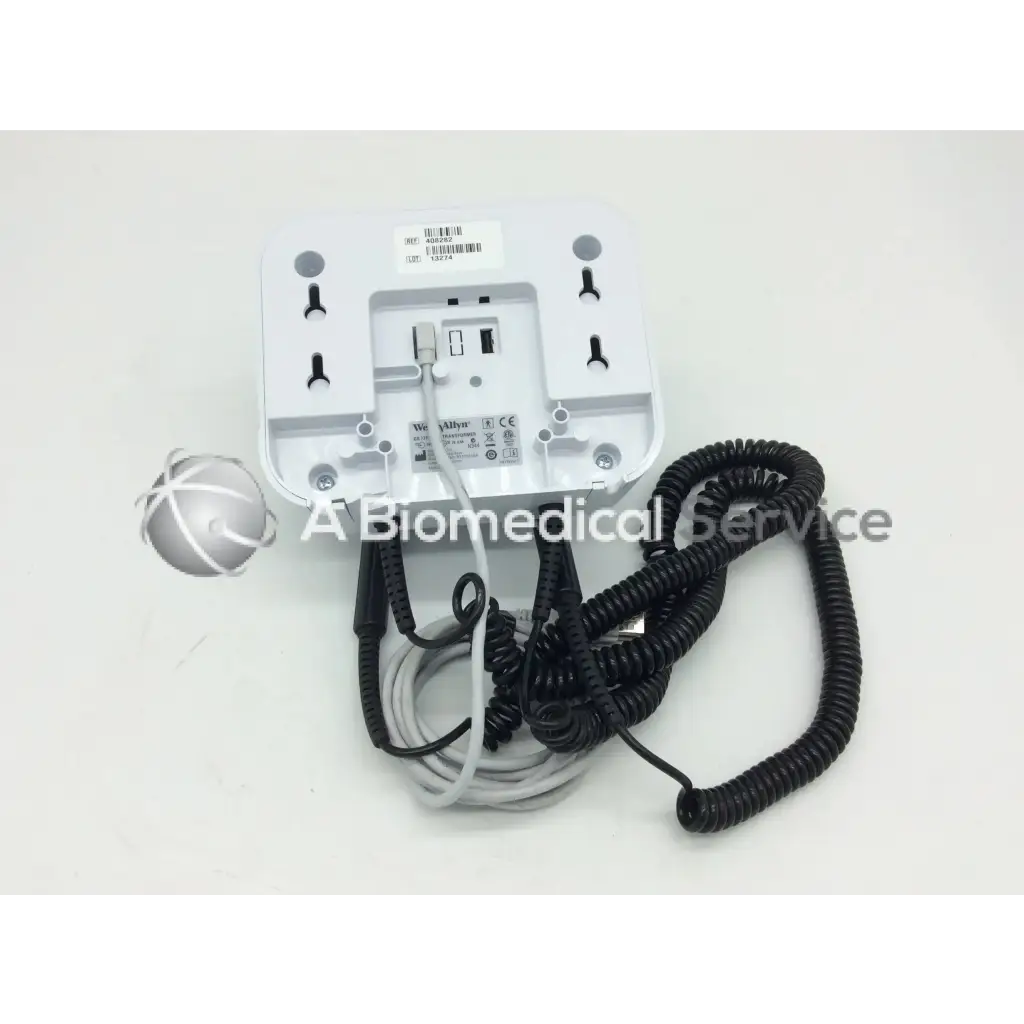 White plastic wall-mounted welch allyn green series gs 777 wall transformer opthalmoscope with coiled cables and silver probe