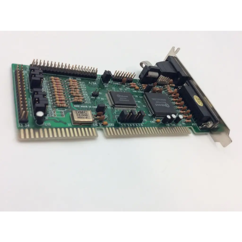 Green printed circuit board with black integrated circuits and gold connectors of winbond 83757 isa multi bbcf1-8 controller