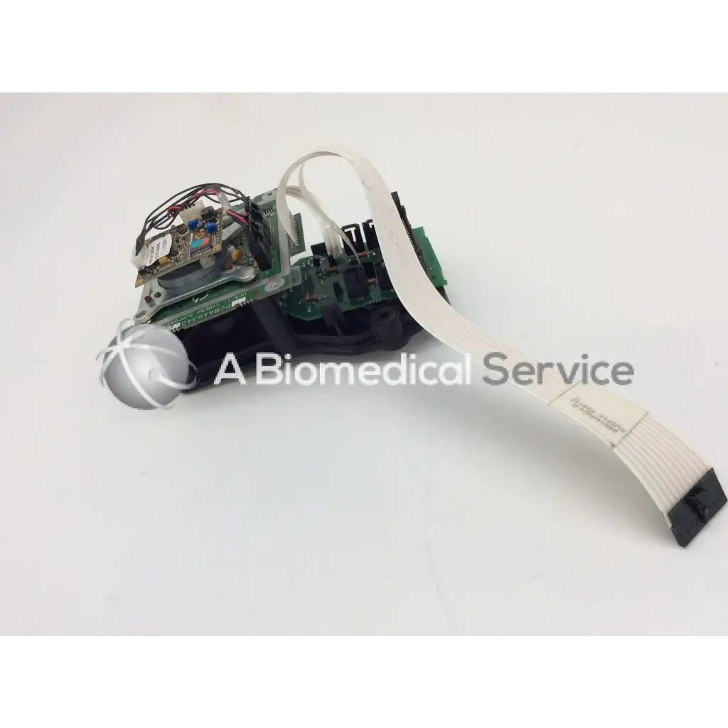 Silver spherical component on green circuit board with wires on zeiss humphrey camera support visual field analyzer board