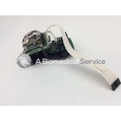 Silver spherical component on green circuit board with wires on zeiss humphrey camera support visual field analyzer board