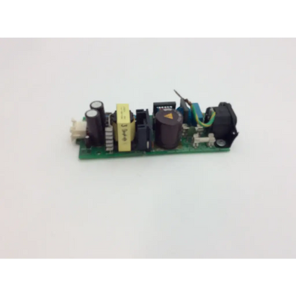 Green zer28l-01 philips power board supply with black and yellow capacitors and blue electronic components mounted on it