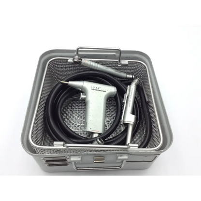 Silver haei hall wiredriver 100 dental handpiece with black coiled pneumatic hose orthopedic driver in metal mesh case
