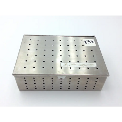 Stainless steel perforated dental instrument box labeled itc for zimmer hall surgical micro 100 set case