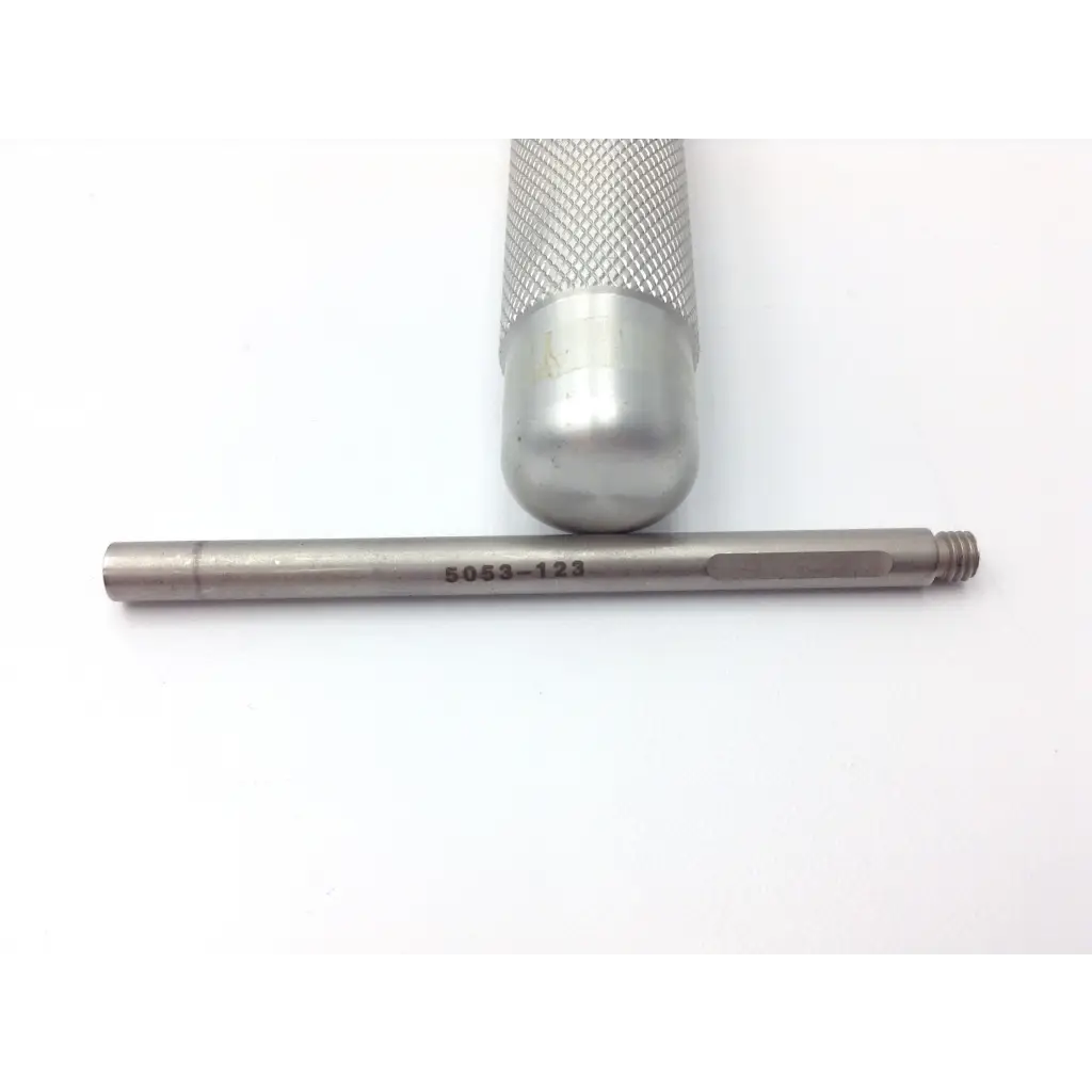 Silver metal caliper with textured grip handle and engraved model number for Zimmer Hall surgical wire driver use