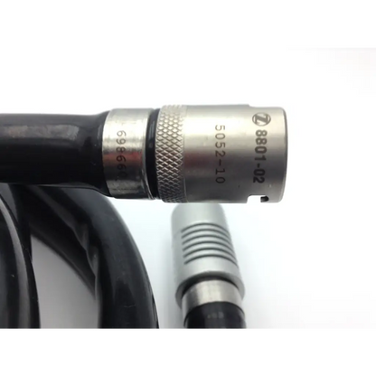 Zimmer hall surgical wire driver metallic connector with textured grip and engraved serial numbers on black cable