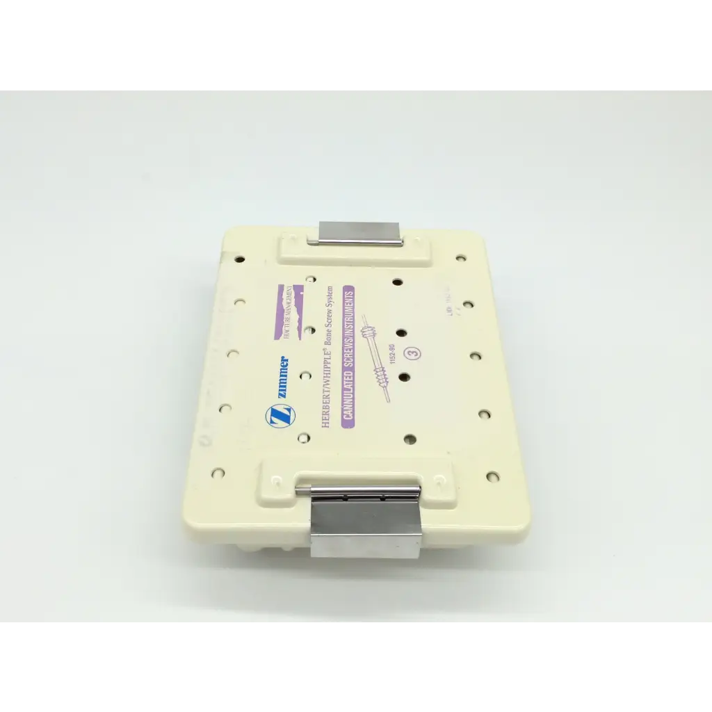 Cream-colored plastic surgical instrument tray with silver clamps for zimmer herbert whipple orthopedic bone screw system
