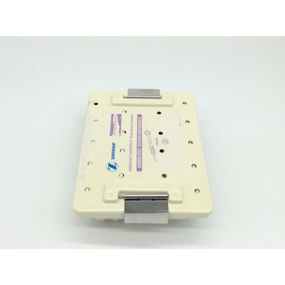 Cream-colored plastic surgical instrument tray with silver clamps for zimmer herbert whipple orthopedic bone screw system